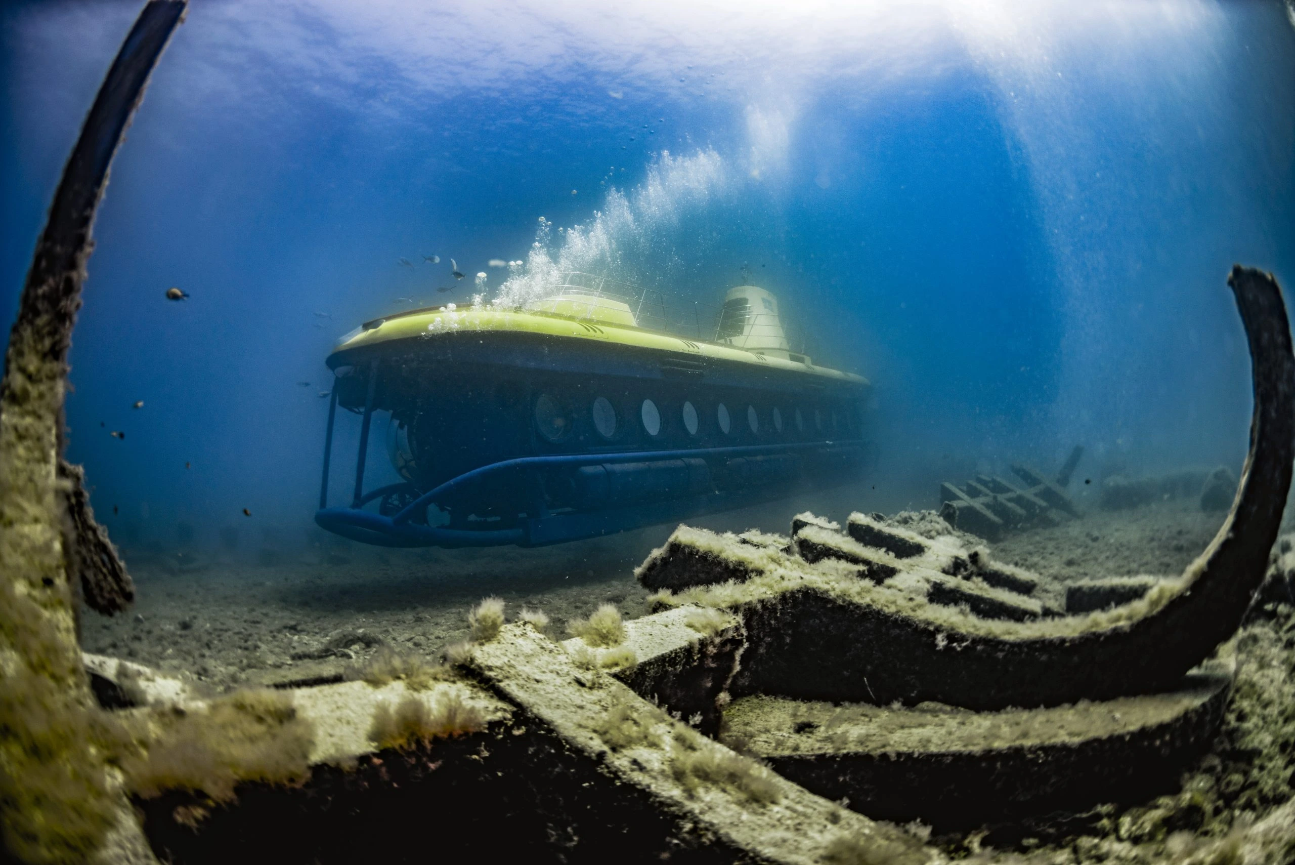 The Golden Shark submarine departing Puerto de Mogán for the Atlantis artificial reef tour