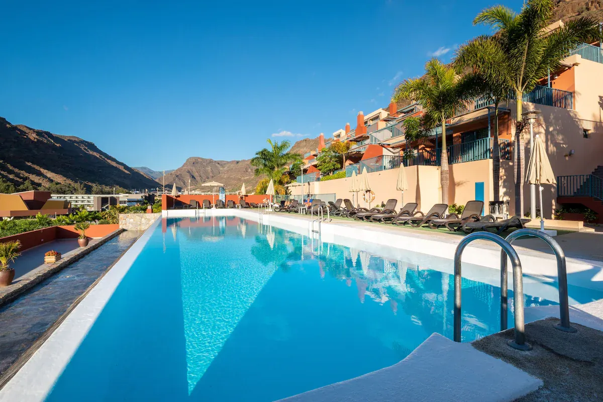 Pool and apartments at Cordial Mogán Valle, Puerto de Mogán