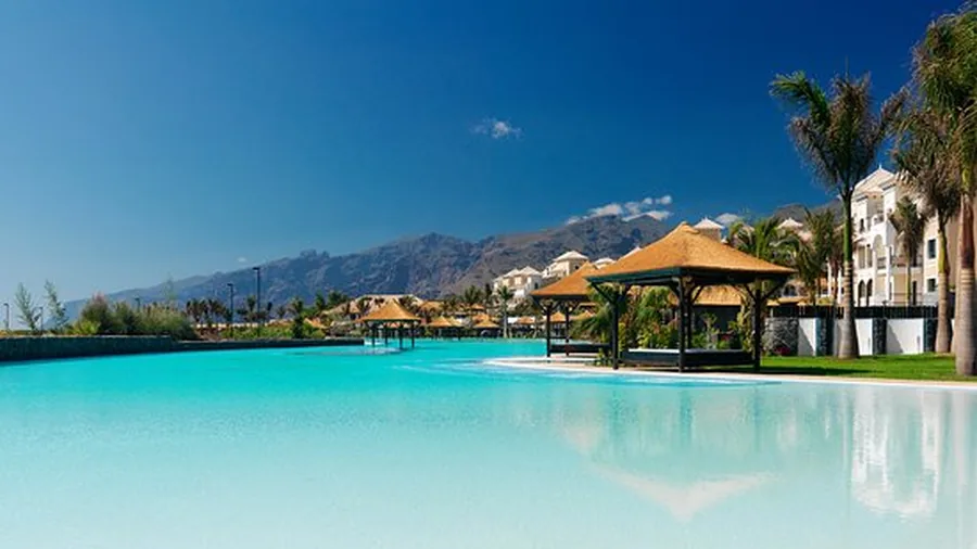Infinity pool with mountain backdrop at Gran Meliá Palacio de Isora on Tenerife's south-west coast