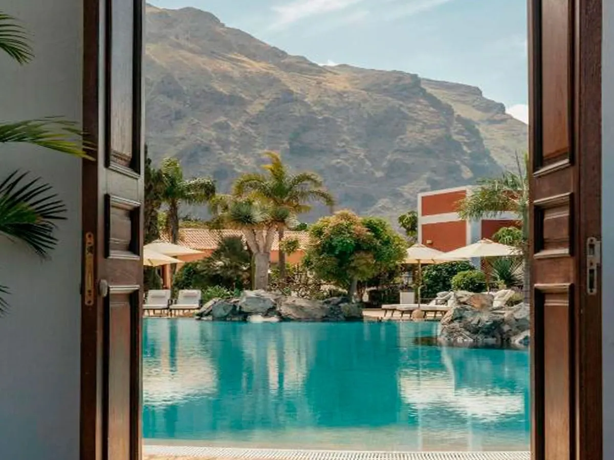Pool and gardens framed by the Teno mountains at Hacienda del Conde, Buenavista del Norte