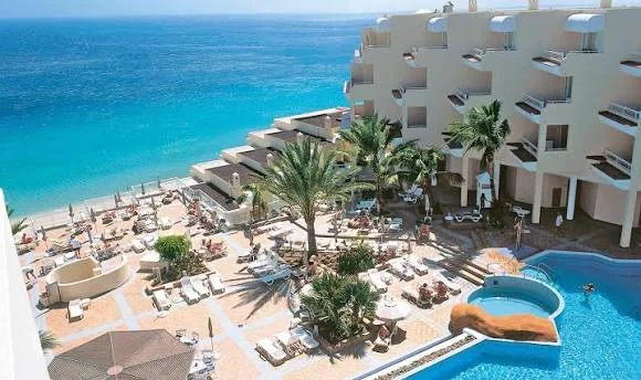 Pool terrace and sea views at Hotel Riu Palace Jandía, Morro Jable