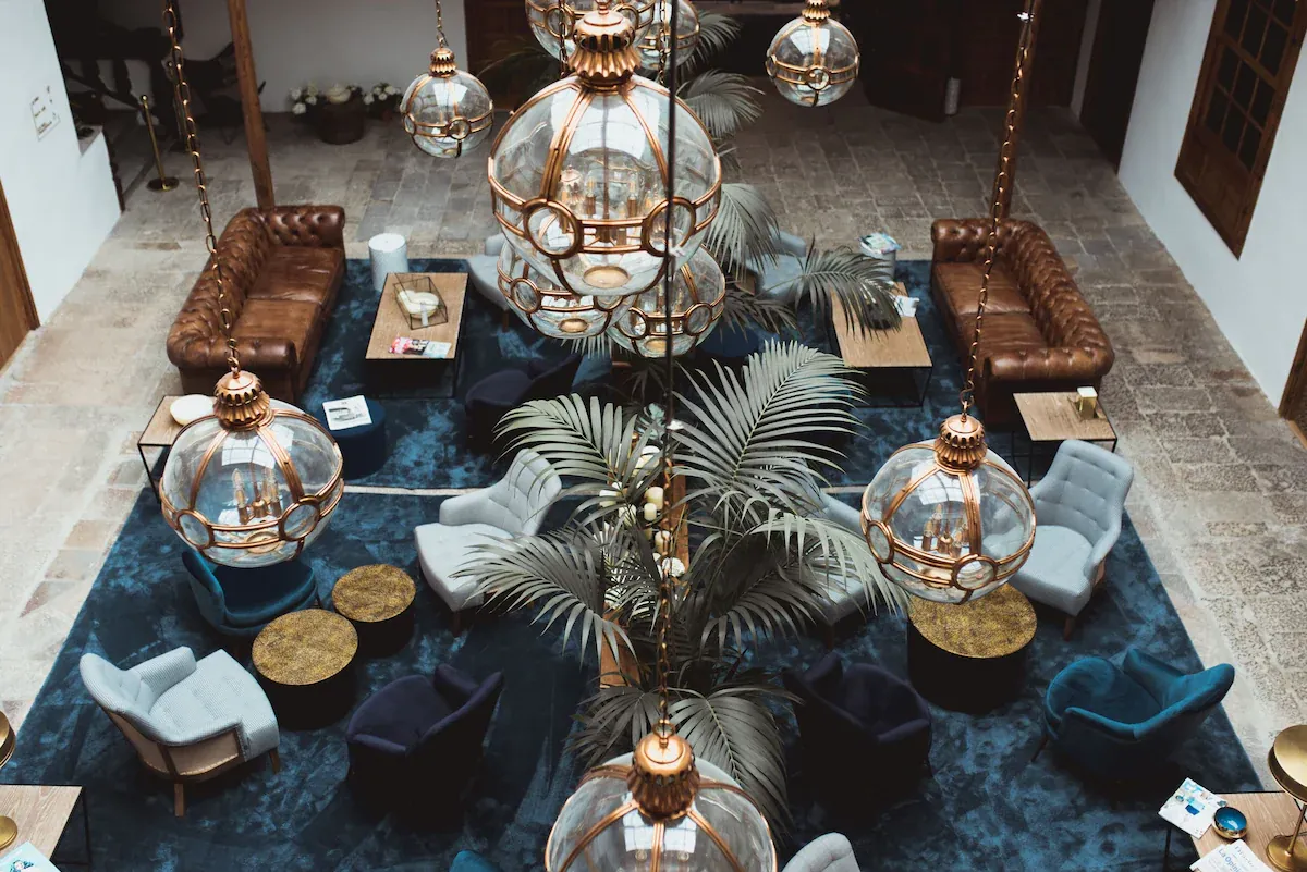 Lounge with lanterns and palms in the courtyard of La Laguna Gran Hotel, San Cristóbal de La Laguna