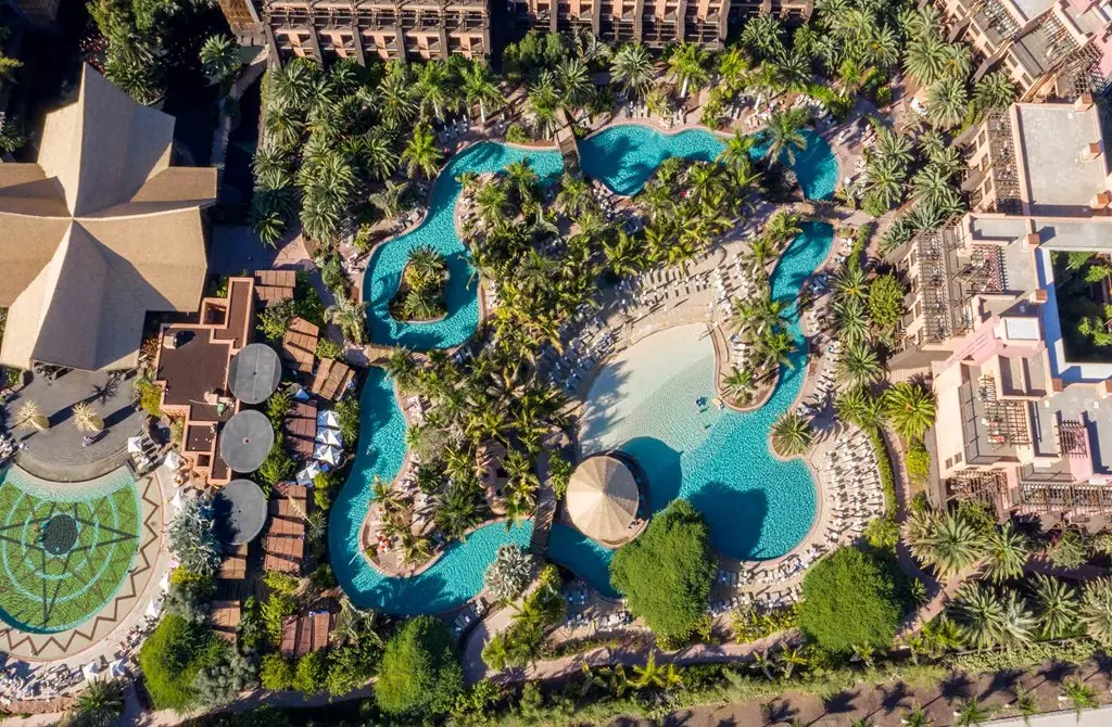 Aerial view of the lagoon-style pool complex at Lopesan Baobab Resort in Meloneras, Gran Canaria