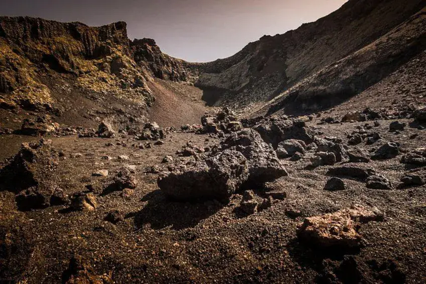 Volcanic boulders inside a crater in Los Volcanes Natural Park