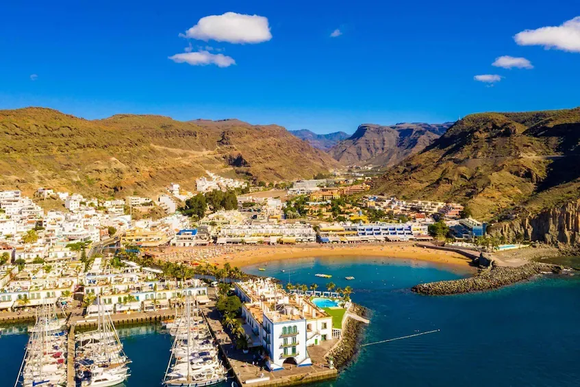 Aerial view of Puerto de Mogán, its marina and beach