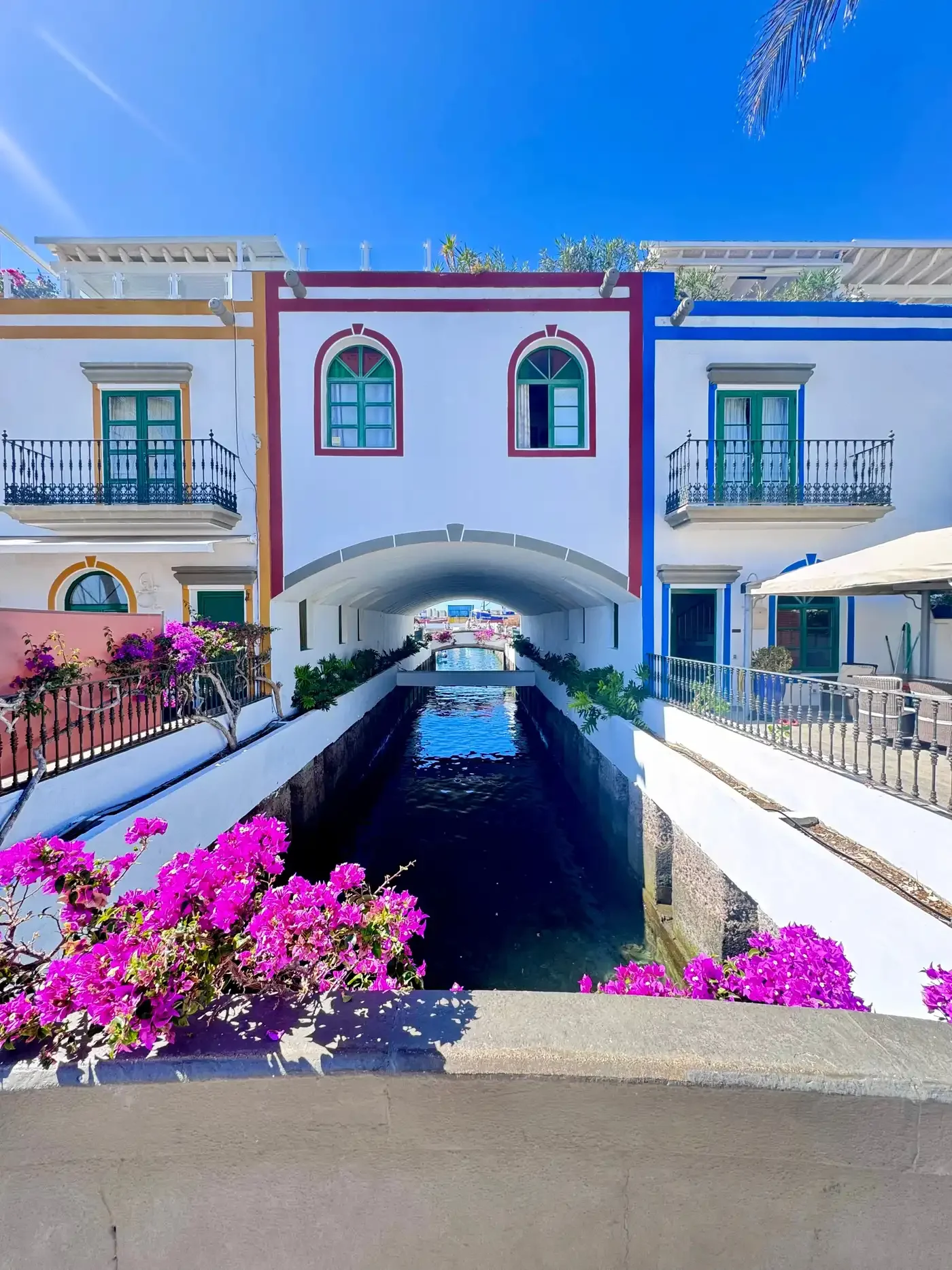 Canal, bridges and bougainvillea in Puerto de Mogán, Gran Canaria