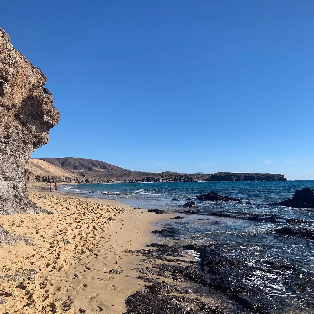 The long, quiet beach of Puerto Muelas at the eastern end of the Papagayo coast