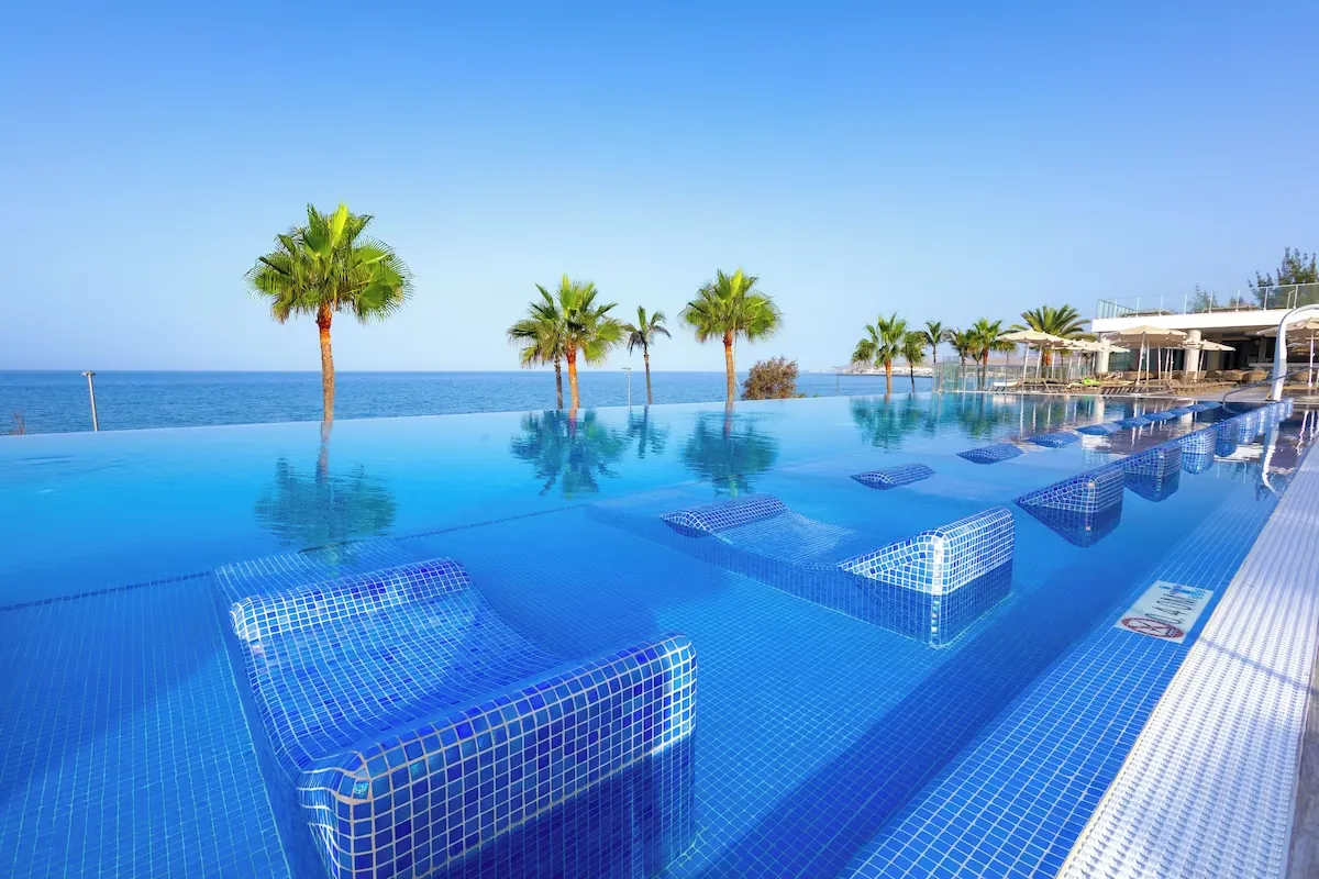 Infinity pool overlooking the ocean at Hotel Riu Gran Canaria, Meloneras