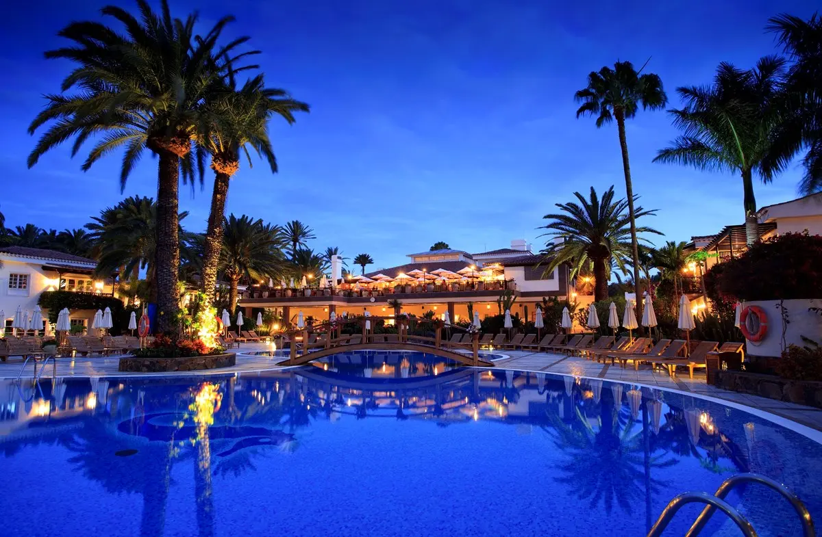 Pool terrace at sunset at Seaside Grand Hotel Residencia beside the Maspalomas dunes