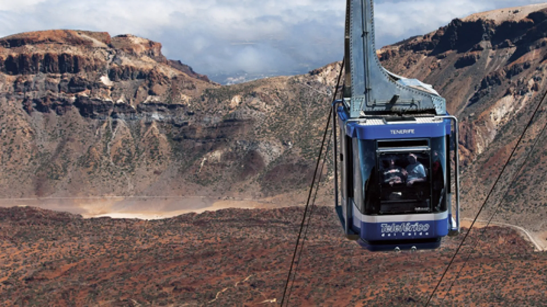 Teide cable car ascending toward the summit at sunset, Tenerife